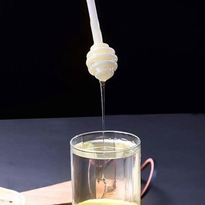 Kép valamiből Üvegedény mézes kanállal