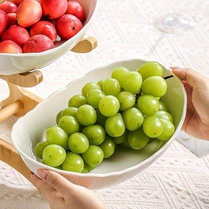 Kép valamiből Kétszintes fa állvány gyümölcs- és élelmiszertálakkal
