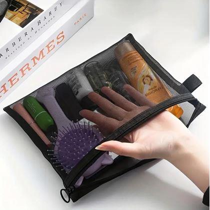 Kép valamiből Átlátszó kozmetikai neszesszer cipzárral