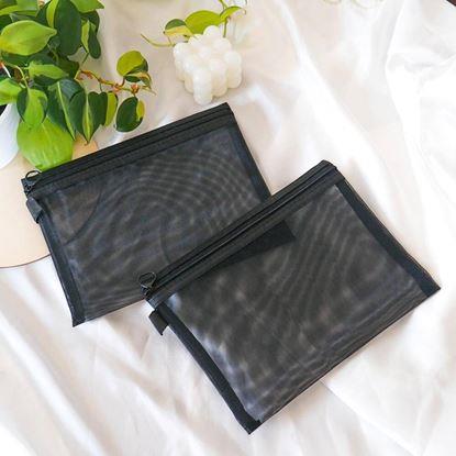 Kép Átlátszó kozmetikai neszesszer cipzárral