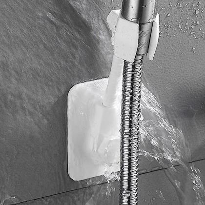 Kép valamiből Öntapadós zuhanyfej tartó