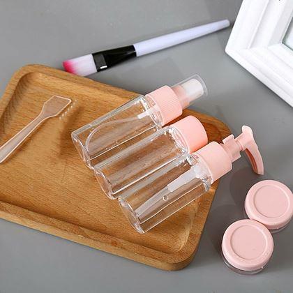 Kép valamiből Utazási kozmetikai üvegcsék készlete repülőgépre való táskával, 50 ml