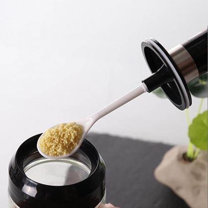 Kép valamiből Üveg fűszertartó kanállal