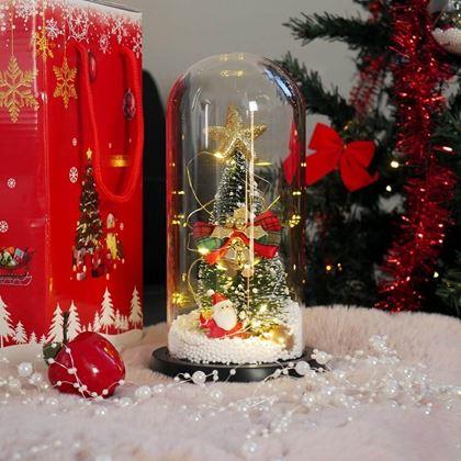 Kép valamiből Világító karácsonyfa üveg vázában, ajándékcsomagolásban