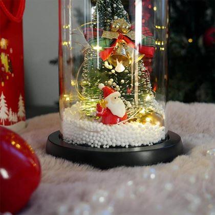 Kép valamiből Világító karácsonyfa üveg vázában, ajándékcsomagolásban