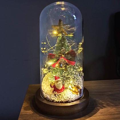 Kép valamiből Világító karácsonyfa üveg vázában, ajándékcsomagolásban