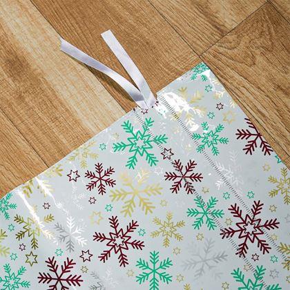 Kép valamiből Karácsonyi ajándékcsomagoló táska madzaggal - 51x39 cm - hópehelyek