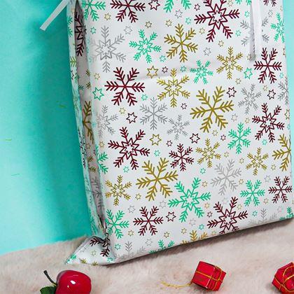 Kép valamiből Karácsonyi ajándékcsomagoló táska madzaggal - 51x39 cm - hópehelyek