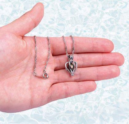 Kép valamiből Kívánság gyöngy kagylóban, nyaklánccal, fülbevalóval és gyűrűvel