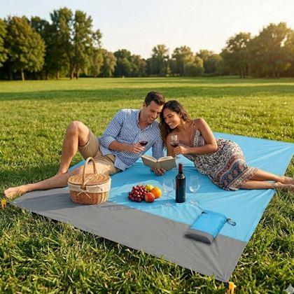 Kép valamiből Víz- és homokálló strandmatrac cövekekkel, 2x2 m, kék