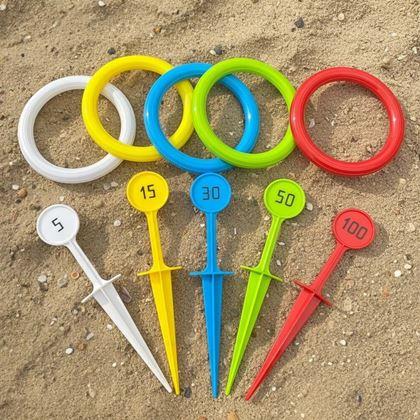 Kép valamiből Gyűrűdobó játék földbe szúrható karókkal